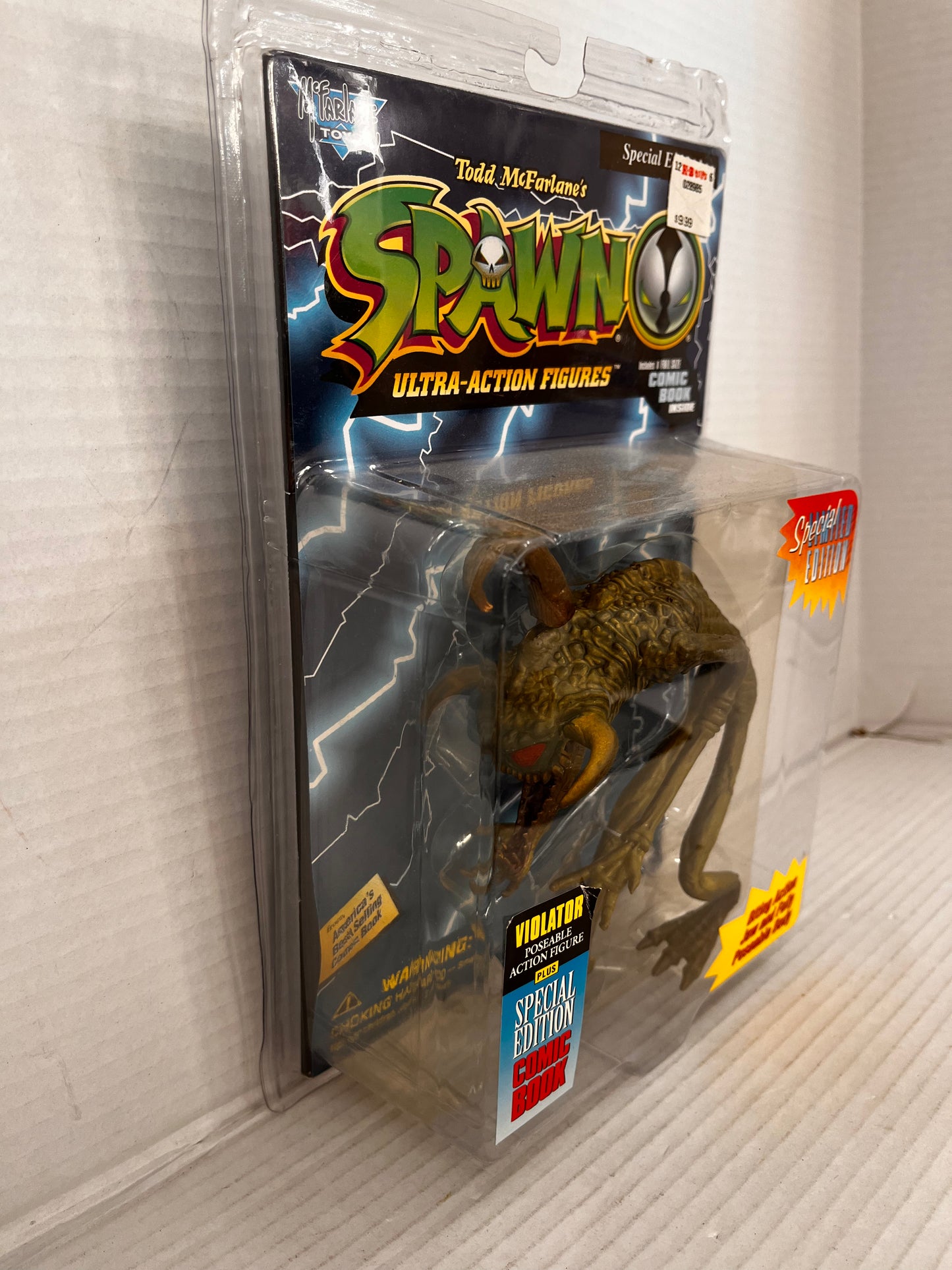 McFarlane Toys Spawn: VIOLATOR 5.5" Poseable Action Figure with Comic Book!