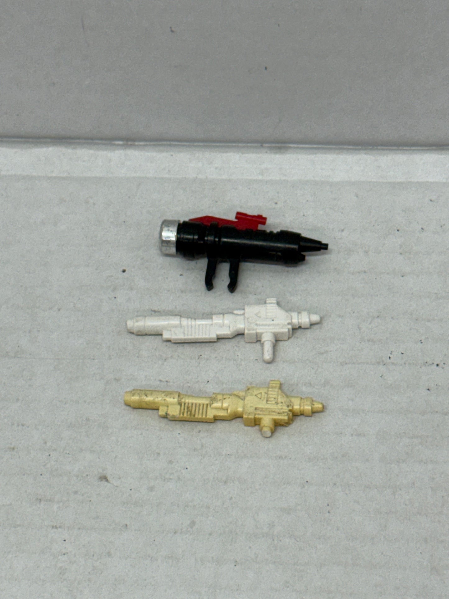 original G1 Transformers Sideswipe Launcher & Gun weapons parts LOT