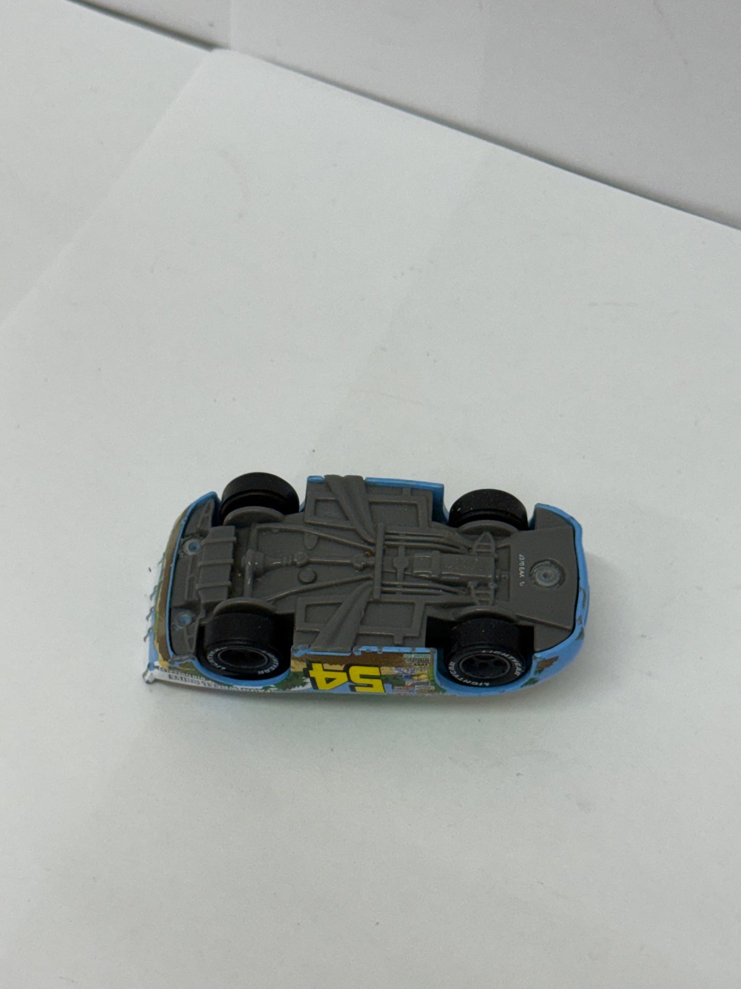 Disney Pixar Cars Johnny Blamer Faux Wheel Drive #54 Diecast 1:55 Piston Cup