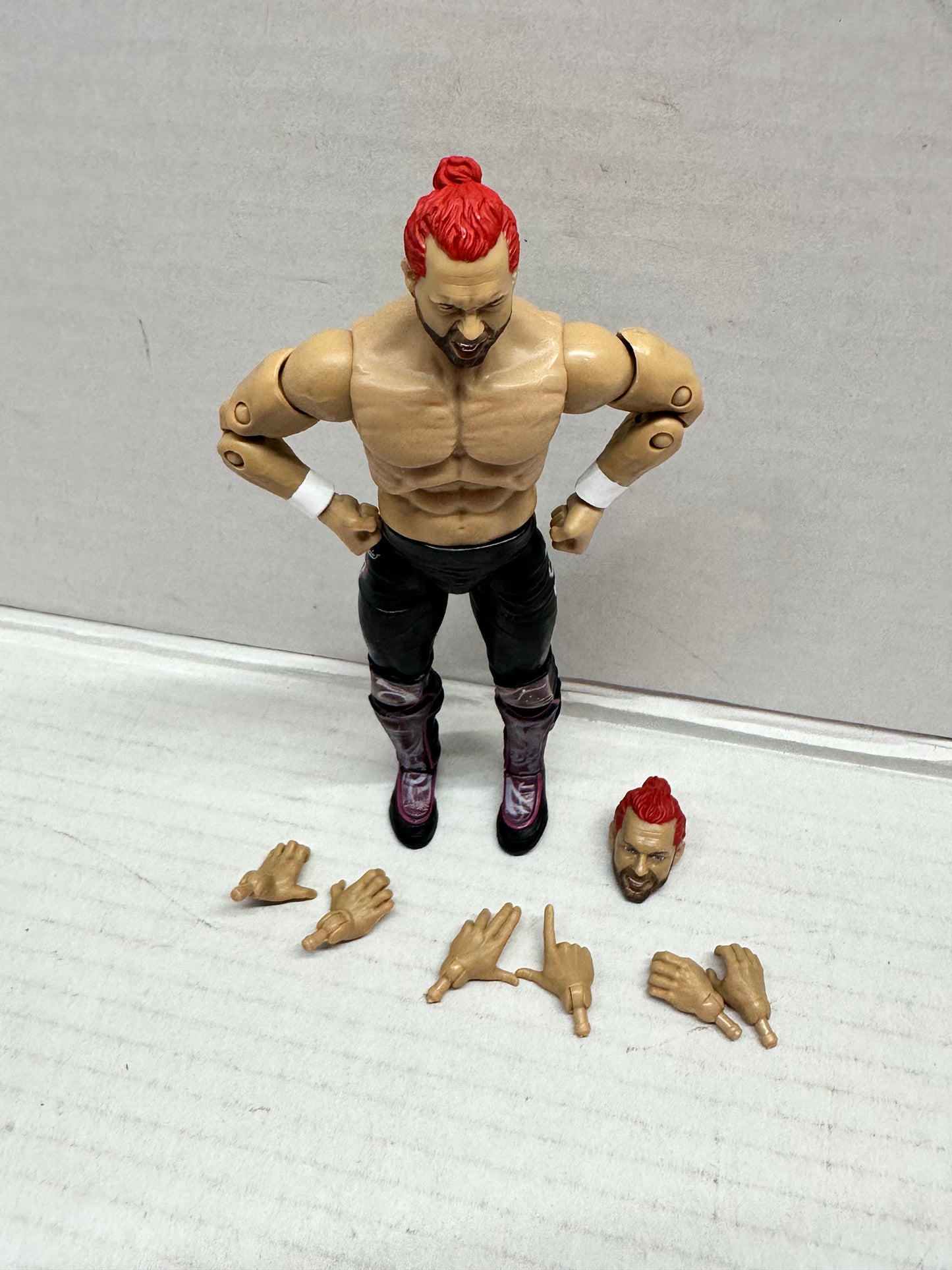 AEW Kenny Omega Action Figure Unrivaled Street Fighter Akuma Gamestop