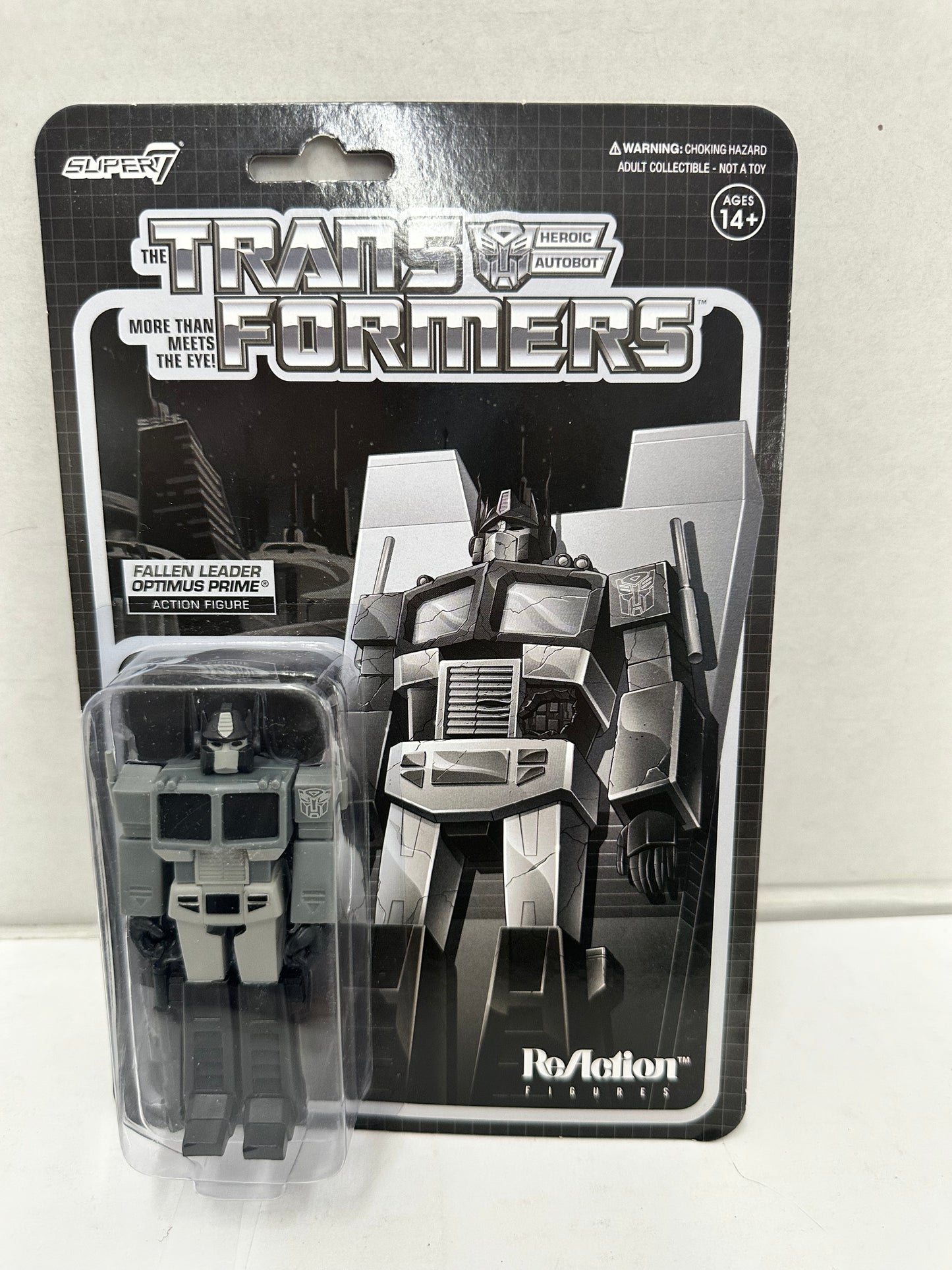 Transformers Super7 Reaction Fallen Leader Colorless Optimus Prime Action Figure
