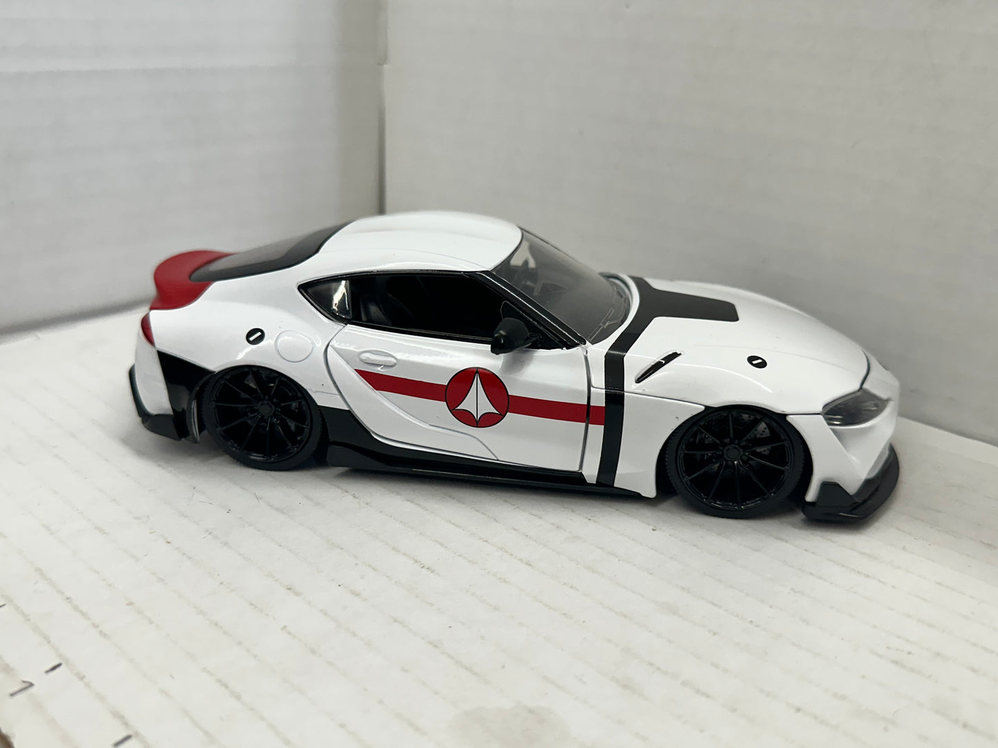 JADA 2020 TOYOTA SUPRA WHITE ROBOTECH 1/24 DIECAST 33685