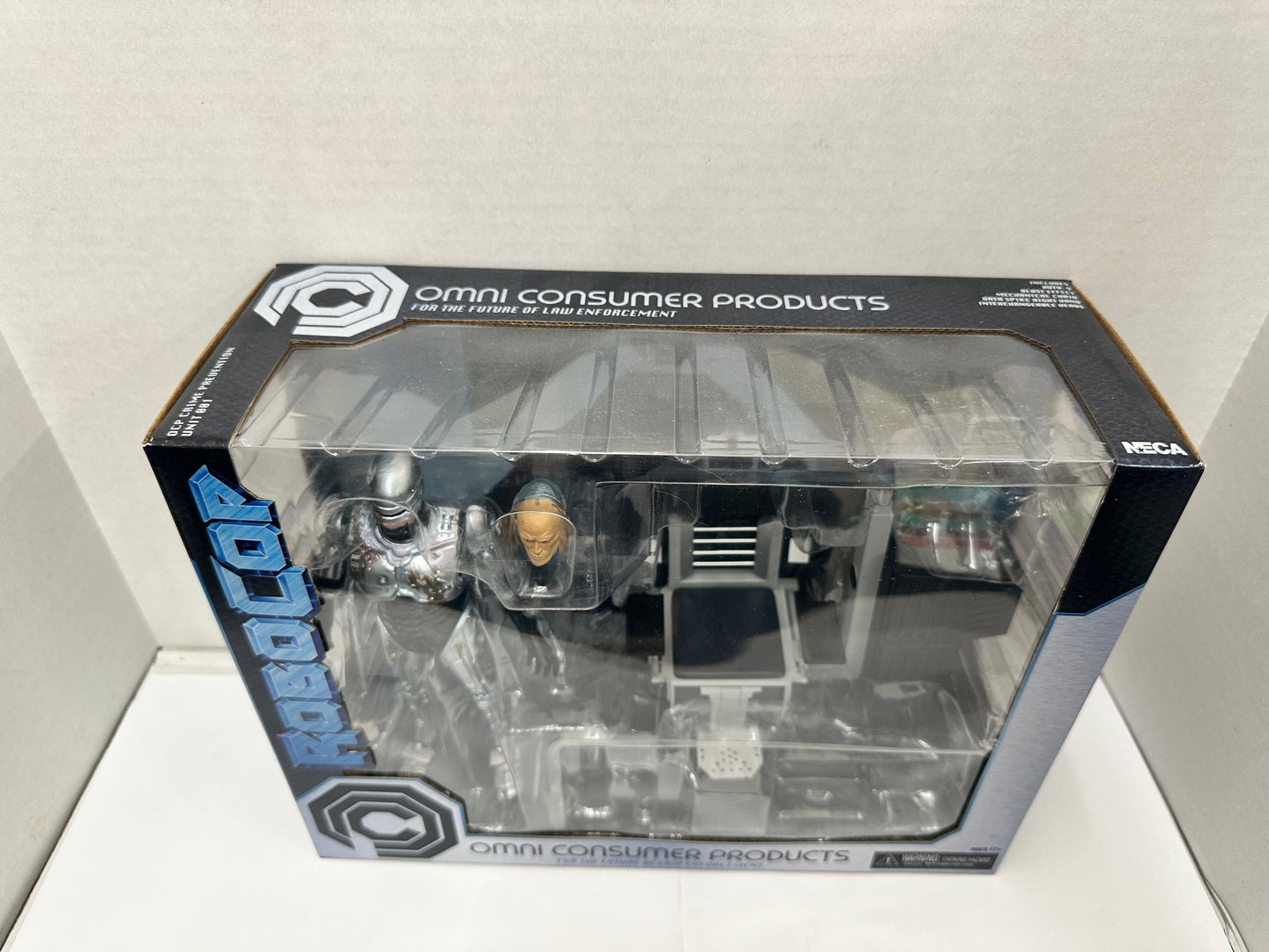 NECA Ultimate Battle Damaged Robocop with Chair 7-Inch Action Figure