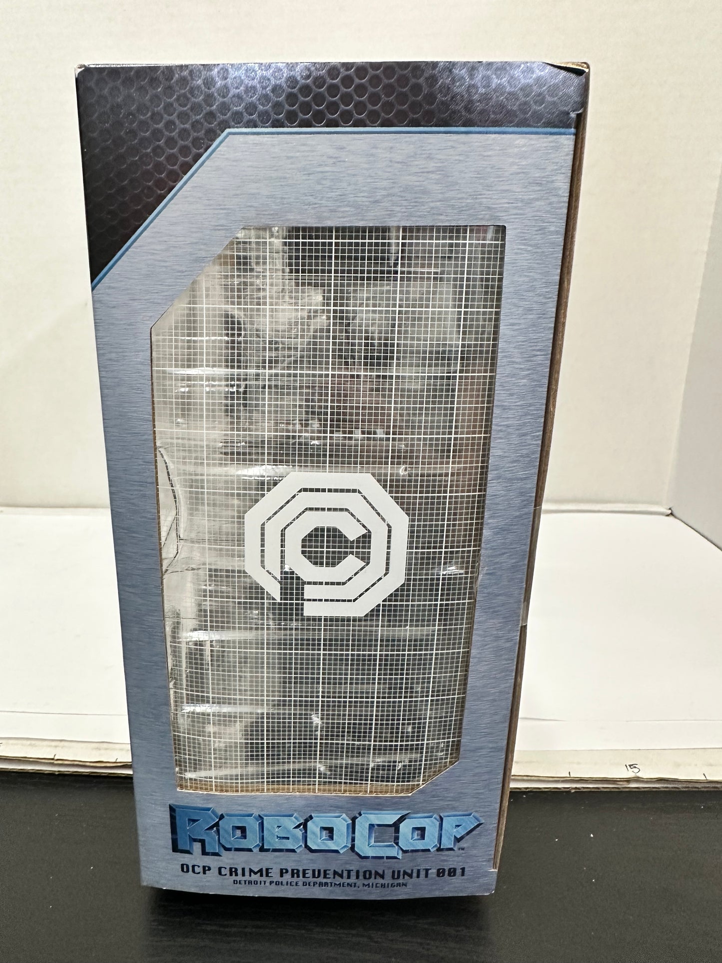 NECA Ultimate Battle Damaged Robocop with Chair 7-Inch Action Figure