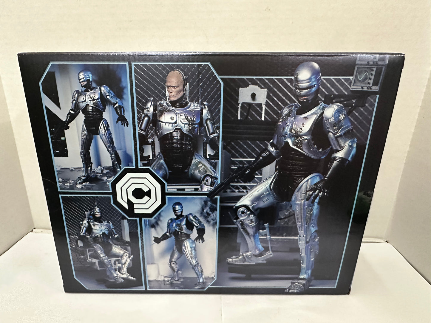 NECA Ultimate Battle Damaged Robocop with Chair 7-Inch Action Figure