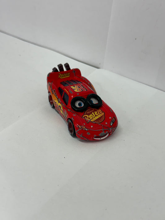 RARE Disney Pixar Cars - SPIN OUT LIGHTNING MCQUEEN TIRES ON EYES - 1:55 Diecast